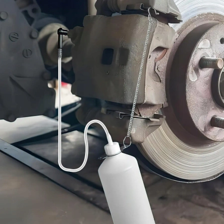 Butelka do zużytego płynu hamulcowego 1l